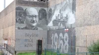str. 9, popisek  Mural na bývalé budově ÚSTR